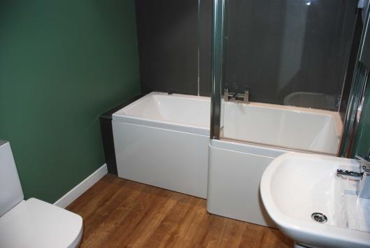and bath; electric shower over bath; fitted
