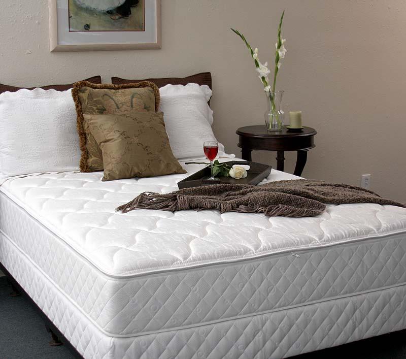 The far bed in the photo is a properly installed watermattress with