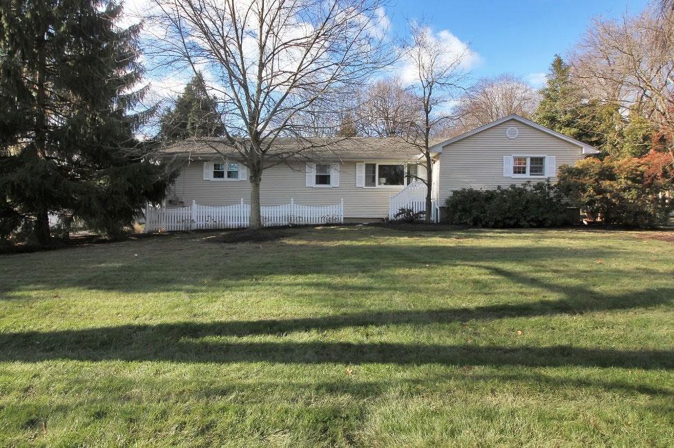 Location: is a lovely and inviting ranch home situated on a park-like property.