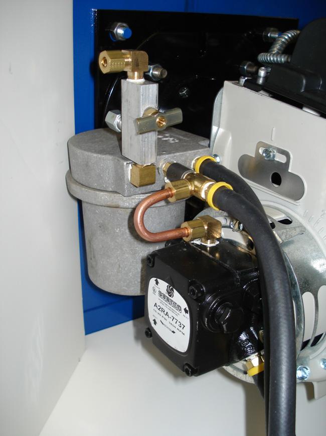 Then mount the air regulator into the bracket, securing it with the black plastic ring nut. 5. Connect the ¼ air line into the right-most fitting in the bottom of the module block.