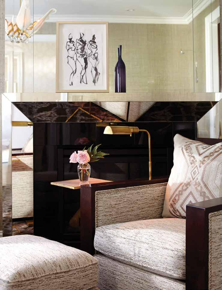 A mirrored mantel in the sitting room brings light and a touch of glamour into