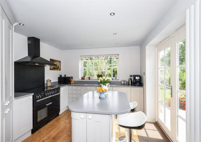 Completely refurbished to the highest standards. Hall, downstairs W.C., study area, Extended luxurious breakfast area and bespoke kitchen, utility.