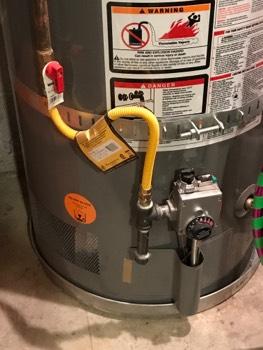 50 gallons Water heater temperature is in excess of 120 degrees, recommend adjustment to prevent