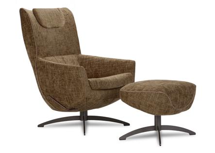 LOUNGE CHAIR GRIFFON Design by HUGO DE RUITER (NL) Elegant nestling in a surprisingly compact lounge chair These days, the need to nestle, as way of escaping from the hectic world outside, is one of