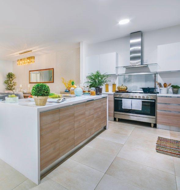 The stainless steel handles, granite counter tops and ceramic tile backsplash are practical