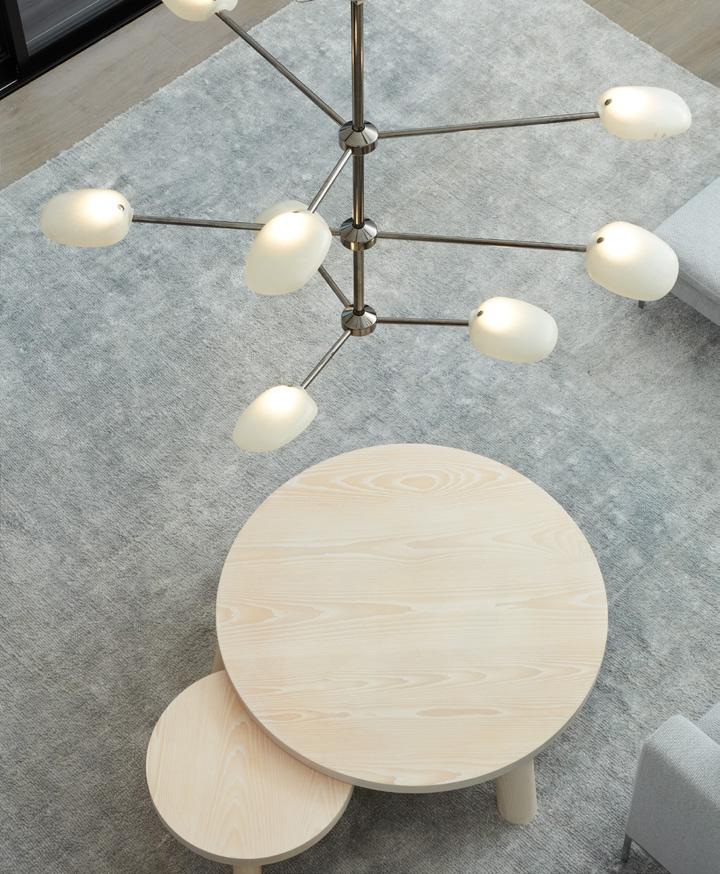 Pilot Chandelier Endless Potential Inspired by organic forms, each arm of the Pilot chandelier features a rounded, shell-like shade.