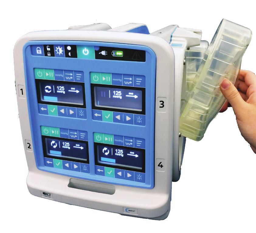 1. Slide a canister into any available canister cradle on the side of the V.A.C.RX4 Therapy Unit as shown below.