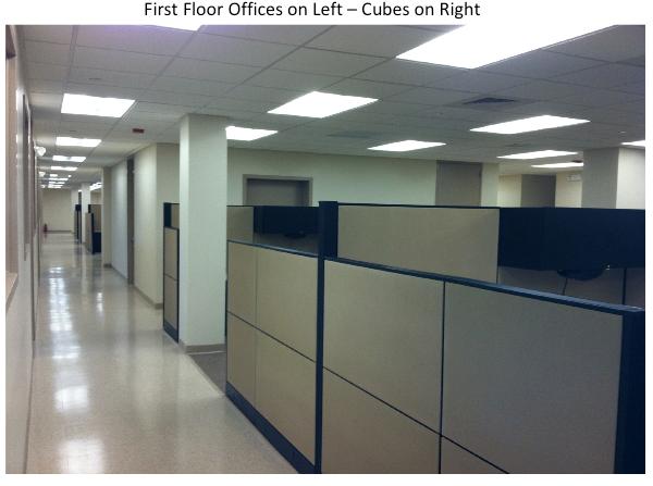 Second floor offices are accessible by stairs from main reception area, by a second stairway at rear of building accessible from main parking lot, or by elevator.