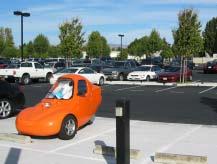 Charging stations allow employees with electric vehicles,