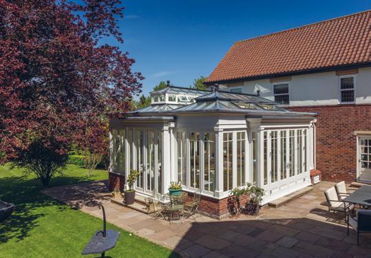 There is beautifully landscaped garden setting off the front of the house which steps down to the tennis lawn and the covered dining terrace on the west side.