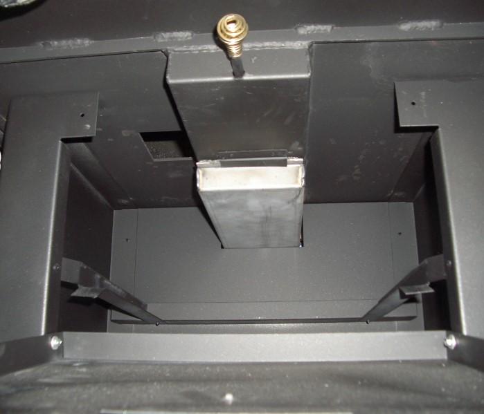 When outside air is to be used, the Mobile Home Combustion Air Adapter must be installed through the rear of the stove base.