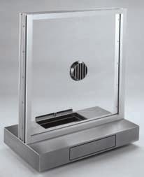 The unique patented counter top and drawer combination is constructed of stainless steel and weatherstripped to minimize energy loss.