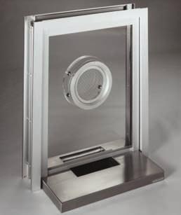 Stainless steel shelf has writing surface in front of built-in deal tray. Deal tray closure helps prevent drafts. Natural voice transmission is provided by the circular draft-free talk thru.
