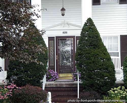 We often get used to things and end up with a beautiful front porch hidden by very tall shrubs.
