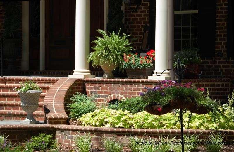 When feasible, extend your landscaping onto your porch.