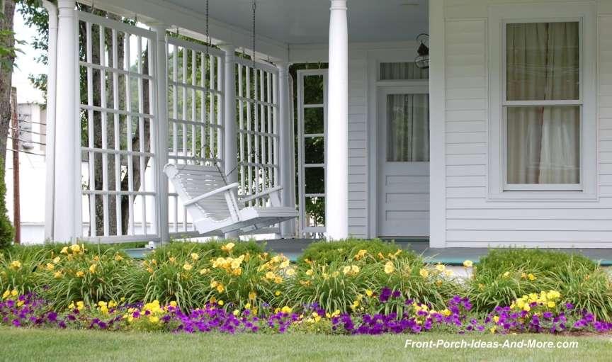 Landscaping can add a burst of color and complement your home and porch.