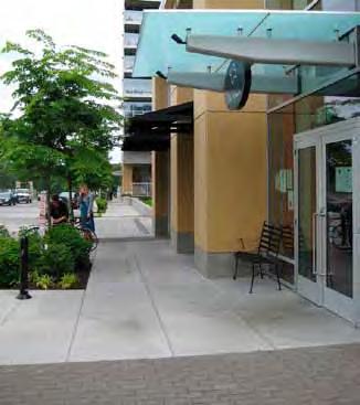 Paving accents, such as banding along the curb or perpendicular to the sidewalk, may be used if consistent with the established style for the district.