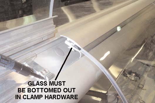 The handle must be removed before it can be repositioned. The handle is held in place with silicone which must be completely removed from the handle and the glass.