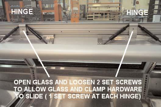 A. Remove the glass and clamp hardware from the case by opening the glass and loosening set screws in hinge, (Metric 3 millimeter set screws). B.