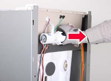 Remove the hose connected to the Ultraviolet Sterilizer Module