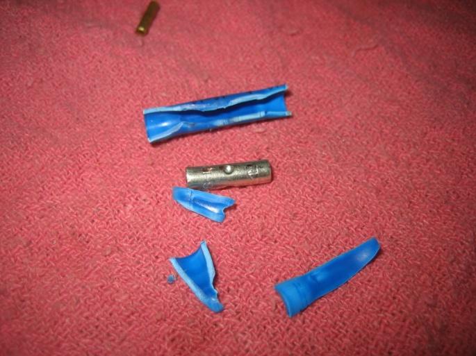 To replace to brass crimps I simply cut the insulation of a blue butt style connector, to extract the metal