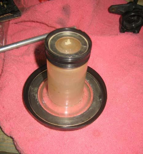 Add the upper seal to the outer plunger.