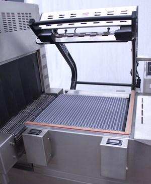 operation of packaging. Another option is hot hole punch, where the a heated element located on the seal arm burns a single hole through the top layer of film.