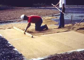 Figure 6a & 6b. Screeding the bedding sand. and compacted, the aggregate base should be at its optimum moisture.