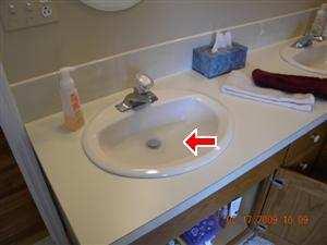B PLUMBING DRAIN, WASTE AND VENT SYSTEMS Comments: Repair or Replace The sink is draining slowly. The sink drain needs cleaning or repair.
