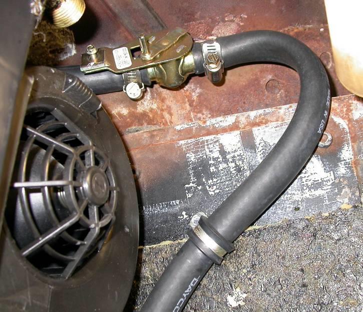 Locate (1) hose clamp and (1) # 10 x ¾ tek screw.