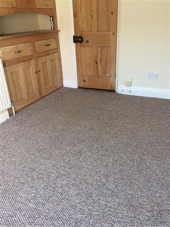 Flooring (Reception room 2) Light brown mottled fitted carpet.