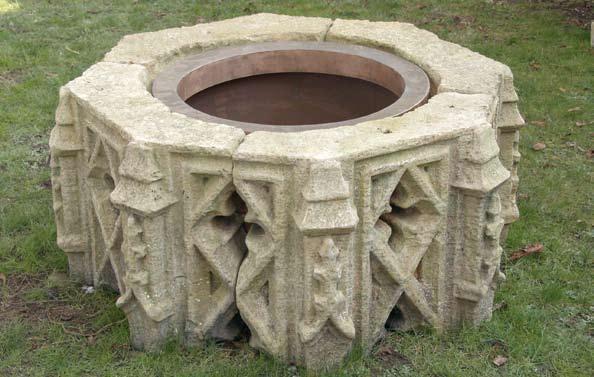 The Gothic Stone Planter [item 48] An age patinated artificial stone planter, in four sections, of hexagonal form pierced with Gothic trefoils, after the original element from the Palace of