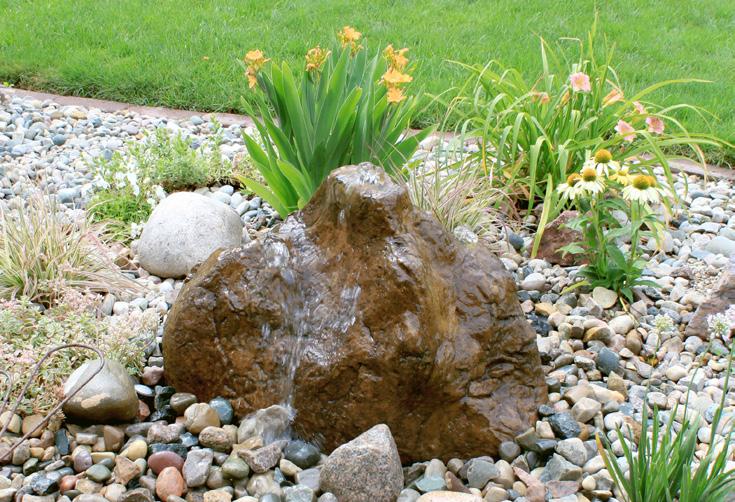 Add decorative gravel and finish off area: Select decorative gravel that compliments your selected fountain, adjacent landscape and