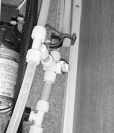 DRAIN DRAIN CLOSE CLOSE IN-LINE VALVE Waterline Drain Valve (Typical) LINE-END VALVE Water Heater Bypass Valve (Typical) Siphon Tube Winterizing Tube Water Tank Drain