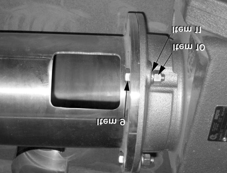 Remove the plastic protective caps, bolt, washer, and square key from the hollow output shaft of the gearmotor.