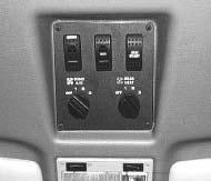 SECTION 2 DRIVING YOUR MOTOR HOME automotive A/C must be on for the overhead A/C to operate. The A/C fan speed control is located on the overhead console in the headliner above the rearview mirror.