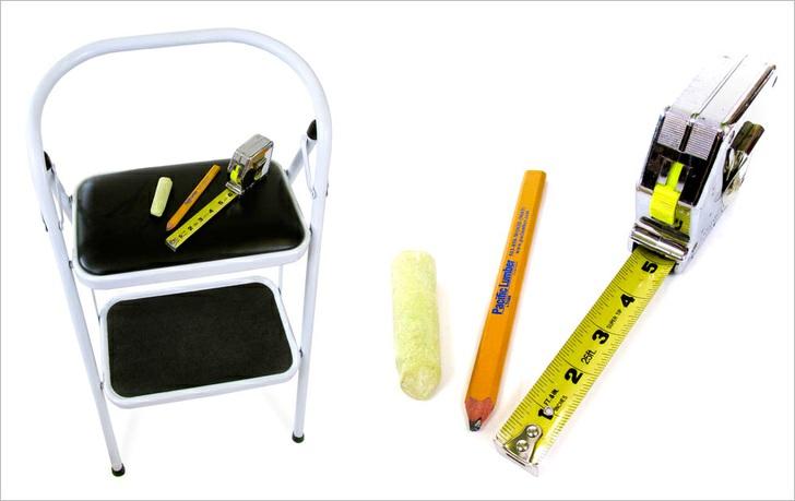 Retractable metal tape measure (the kind contractors use) Step ladder or tall step-stool Chalk for marking the wall Pencil for marking the holes where your hardware will go Step 1: Come up with your