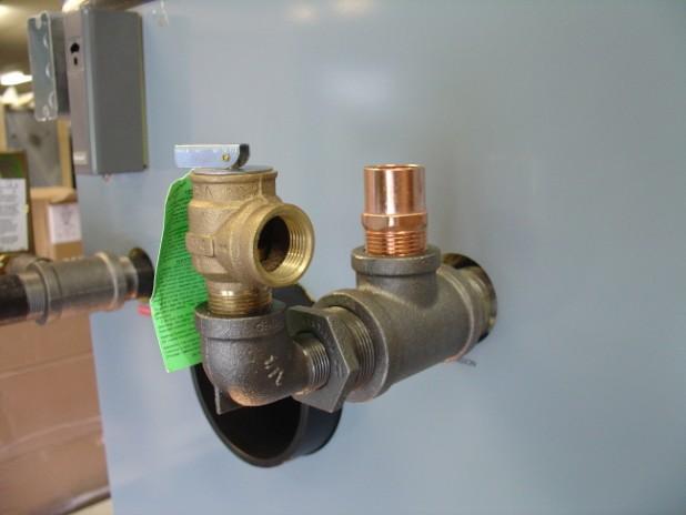 Boiler Installation & Start-up > Commissioning the Boiler Page 31 3.5 Commissioning the Boiler 3.5.1 Safety Plumbing The boiler pressure relief valve (provided, part # 1040705), must be installed as shown in Fig.