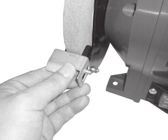 To turn the grinder on, depress the rocker switch on the right hand side (I), to turn the tool off, depress the left hand side of the rocker switch (0). Fig. 7 Fig. 8 Fig.