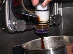 Carefully pour the prepared Iced Cappuccino Mix into the hopper and allow it to flow into the