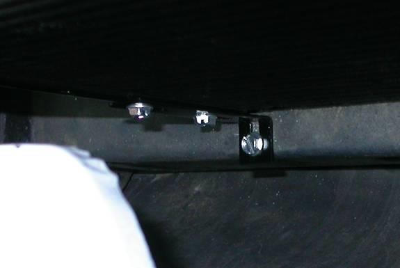 Locate (2) # 10x ¾ tek screws.