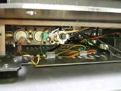 12) Carefully lift the burner tray assembly out of the unit to remove. 13) Replace with new valve assembly and reverse steps to reinstall.. To remove valve from valve assembly, continue.