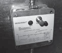 The primary sensor (usually 165 F [74 C]) can be bypassed by an external electrical signal allowing the damper to reopen and remain open until the temperature reaches the setting of the secondary