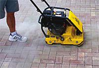 Failure to ensure that the surface of the pavers is free from polymeric sand may cause damage to the pavers. Apply a fine mist of water to the polymeric sand to activate the binder.