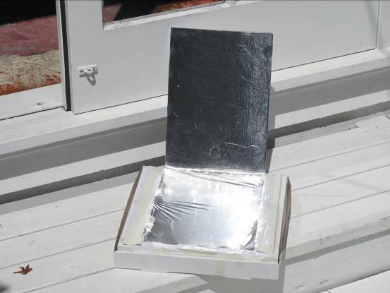 Instructions for Testing a Pizza Box Solar Oven 1. On a sunny day, carry the box outside with your food 2. Find a sunny spot.