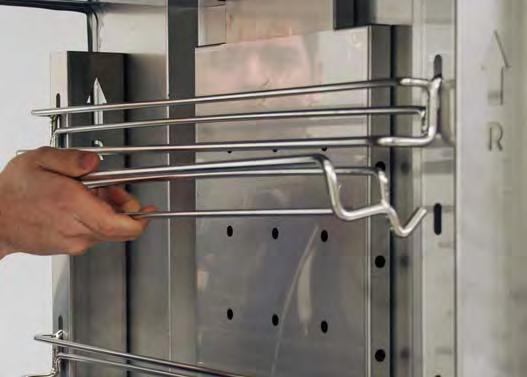 Install tray slides into uprights with J