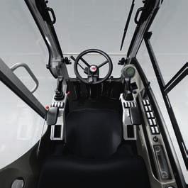 2 New cab interior with ample head- and legroom and newly integrated storage areas. Also new: the stable joystick mounting, instrumentation mounting and pedals.