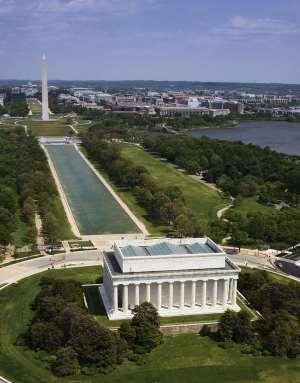 along the reflecting pool to the huge obelisk of the Washington Moument and beyond to the US Capitol Building.