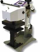 perfect machine. This press is also used heavily for large quantity small label application, with the smaller 6 x8 label press head and bottom tables.