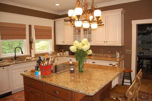 tops, island with Bosch cooktop, custom cabinetry, window treatments,